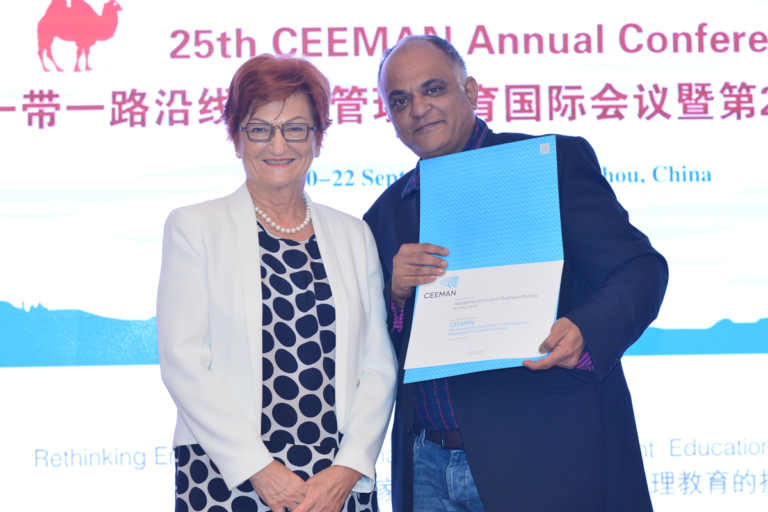 CEO Nilesh Sarawate Receiving Institutional Membership Certificate from CEEMAN President Danica Purg